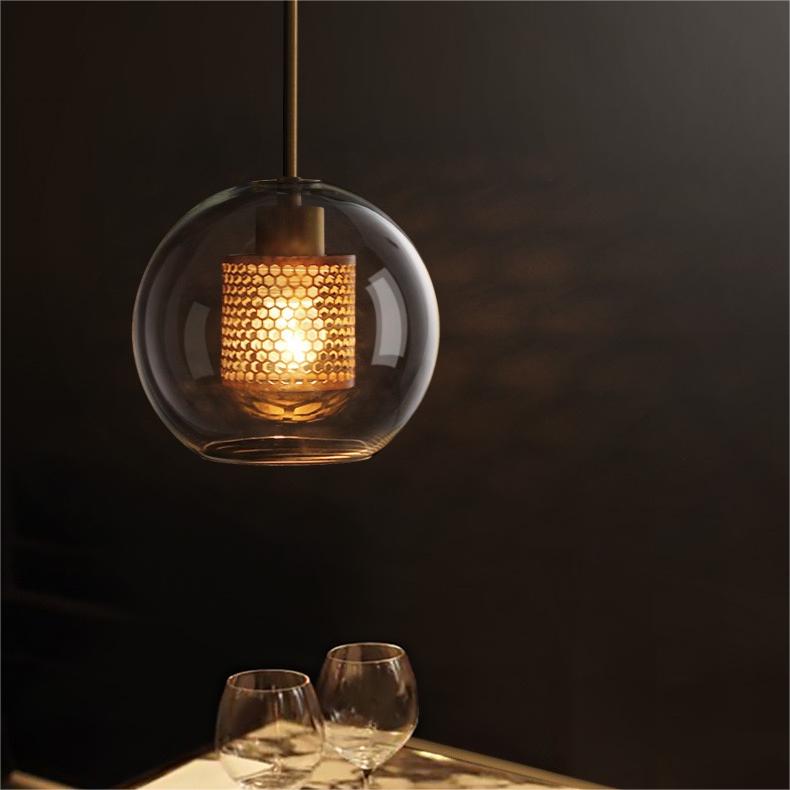 Hessa Contemporary Golden Pendant Light — Glass Globe and Cylindric Shape
