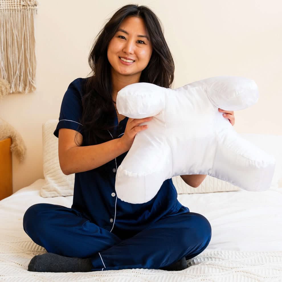 Almohada ergonómica CalmNest para aliviar el dolor de cuello y espalda