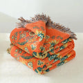 Couverture double face CozyNova couleur souci pour les amateurs de câlins, confort toute saison