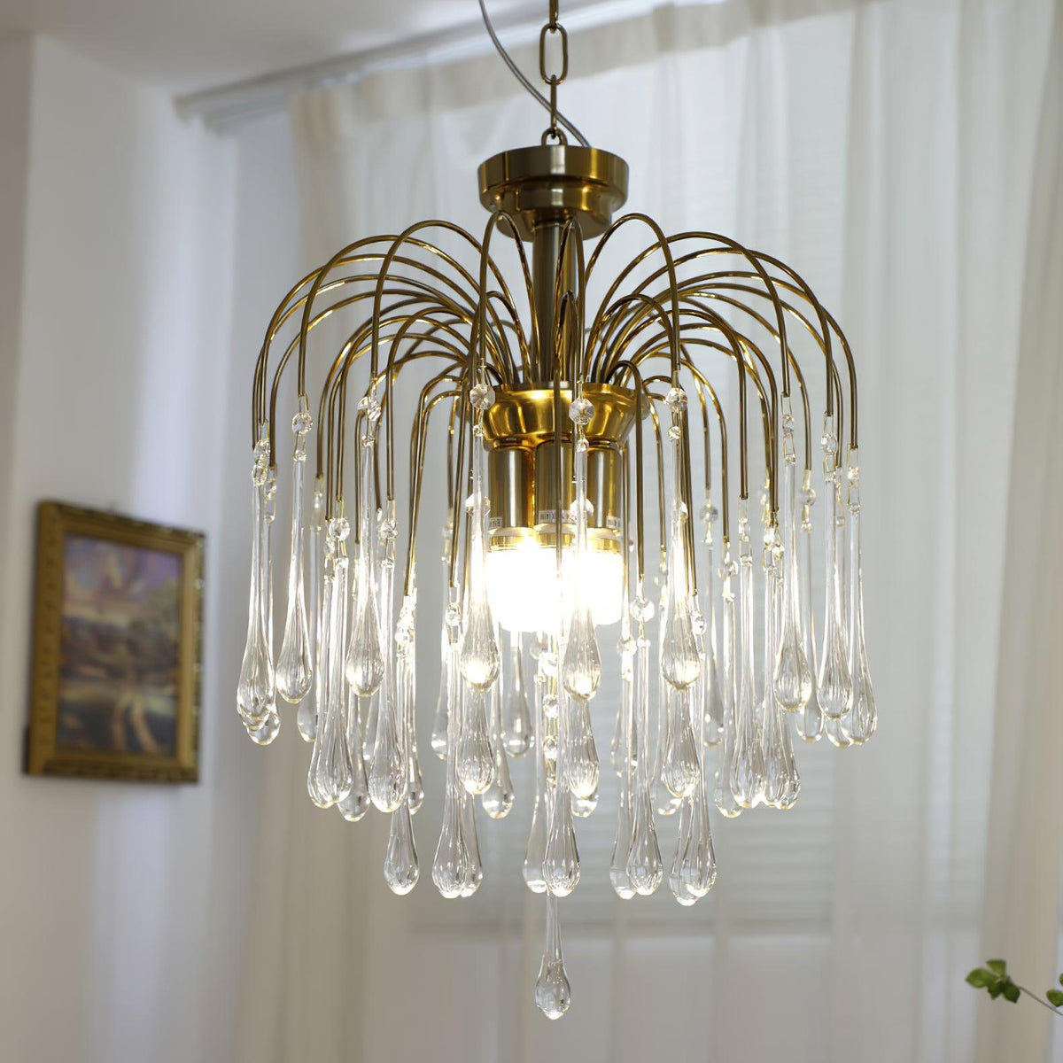 Lampadario Maltose — cascata di ottone e cristallo