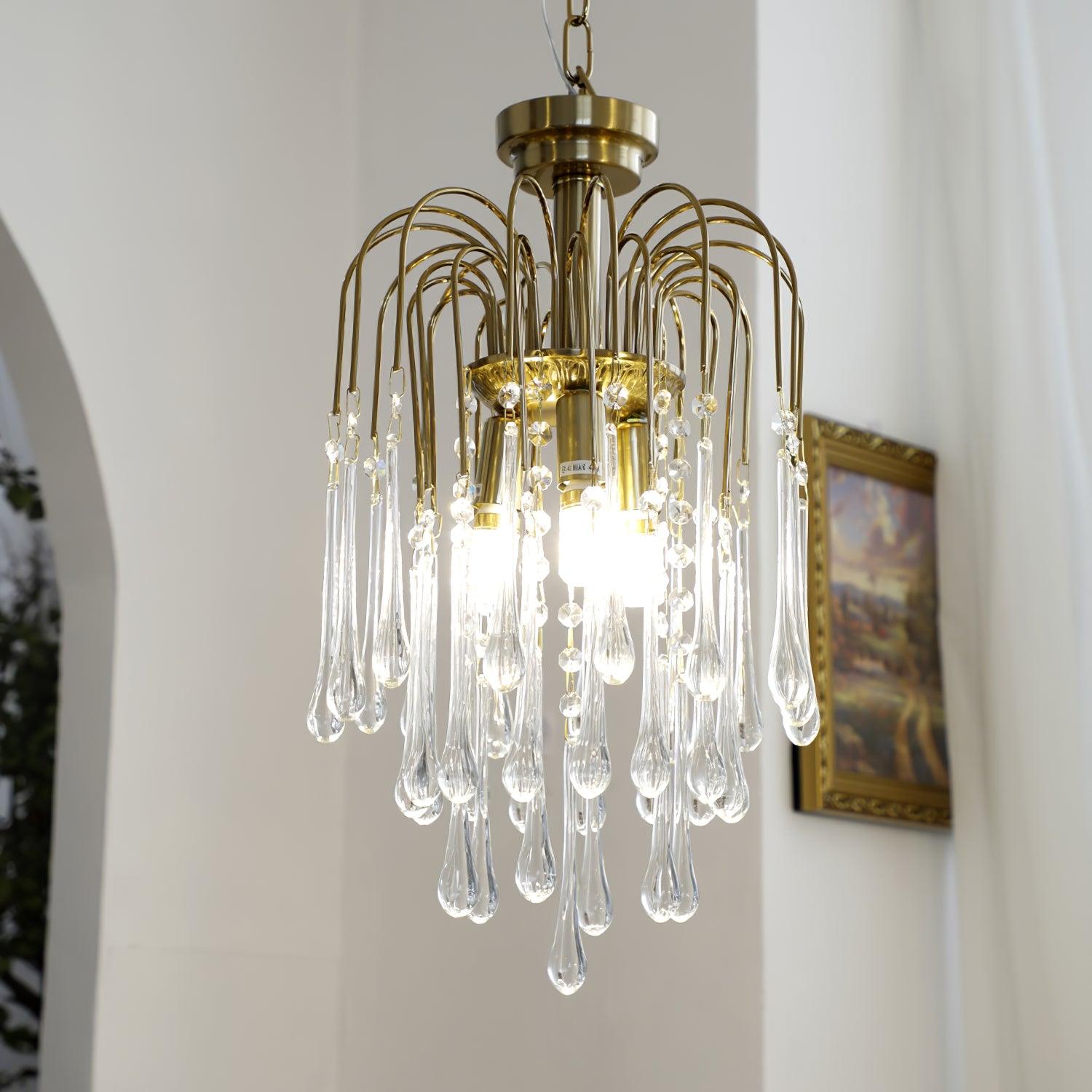 Lampadario Maltose — cascata di ottone e cristallo