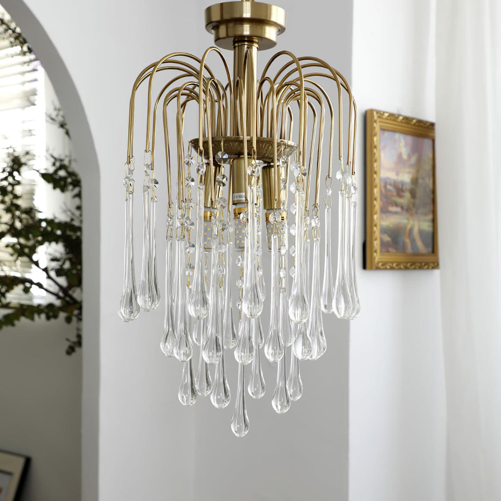 Lampadario Maltose — cascata di ottone e cristallo