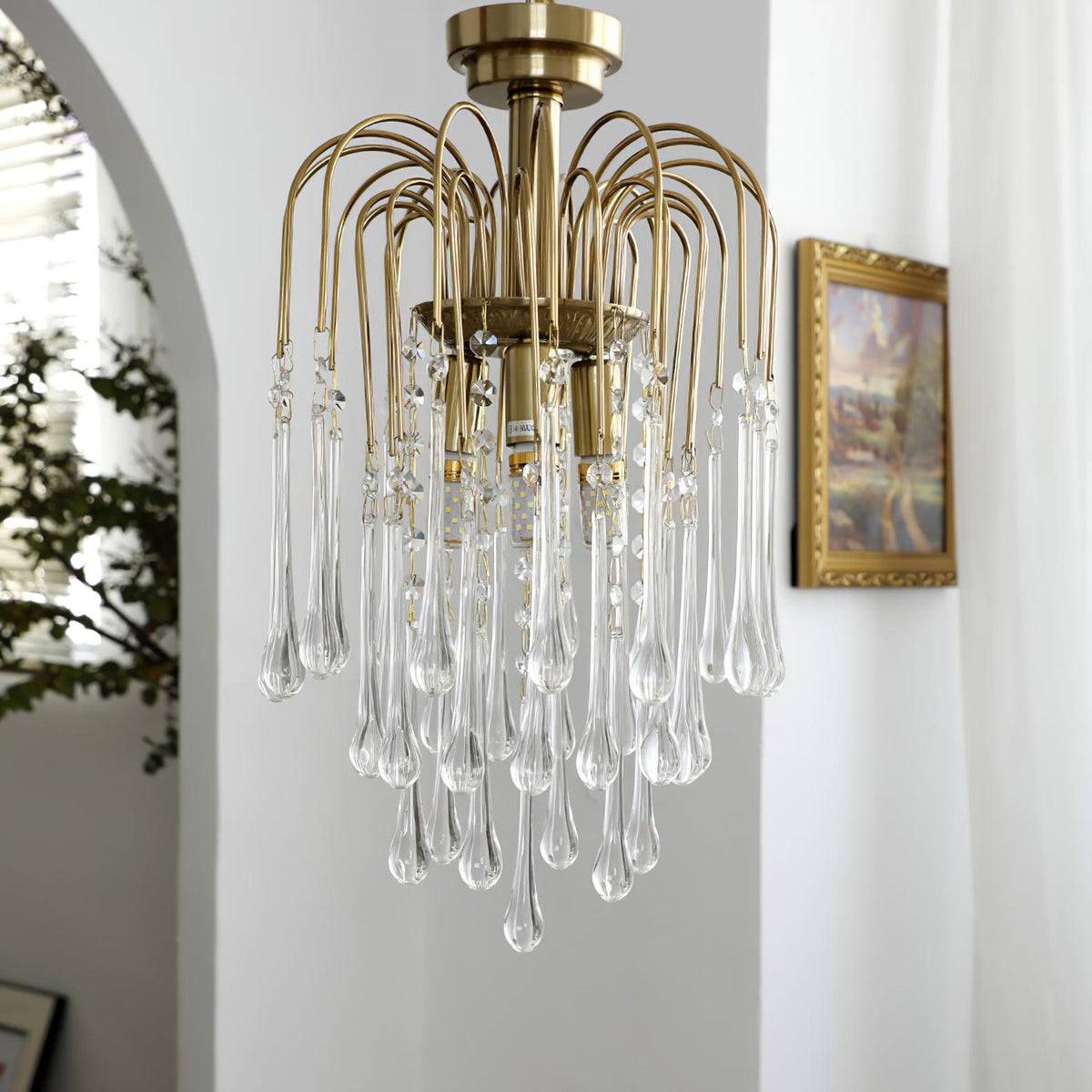 Lampadario Maltose — cascata di ottone e cristallo