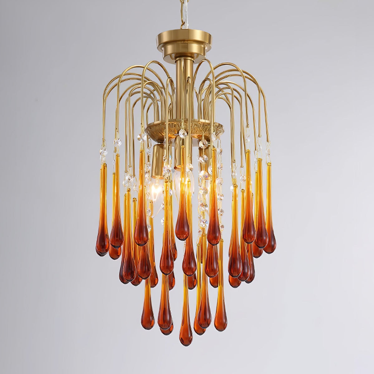 Lampadario Maltose — cascata di ottone e cristallo