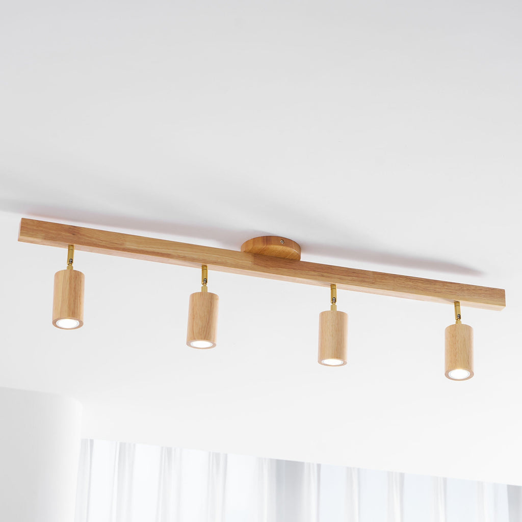 Schienenstrahler mit natürlichen Holzbalken