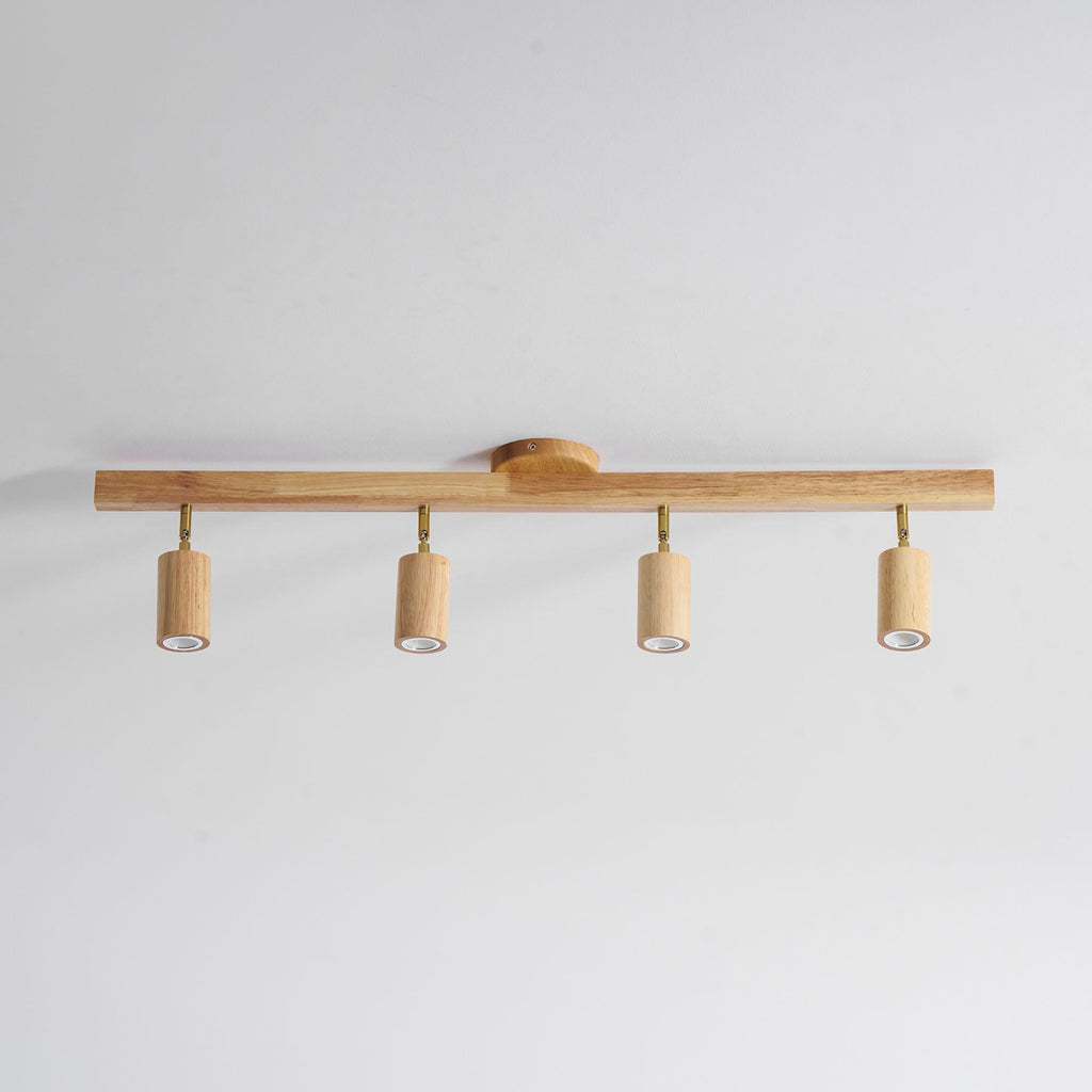 Schienenstrahler mit natürlichen Holzbalken