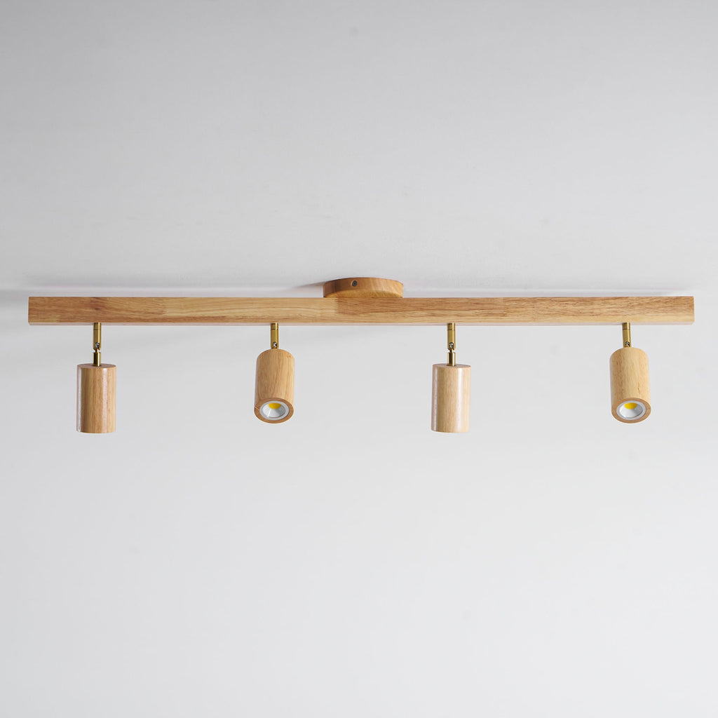 Schienenstrahler mit natürlichen Holzbalken
