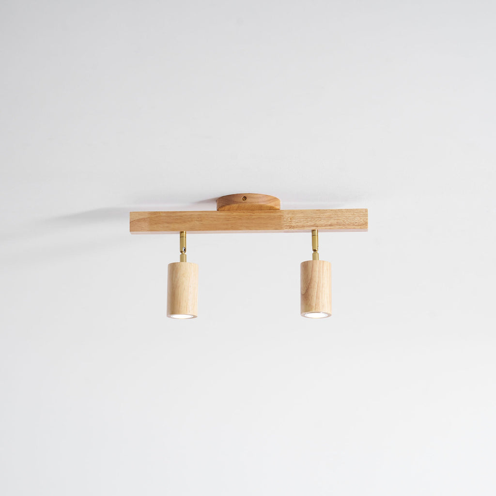 Schienenstrahler mit natürlichen Holzbalken