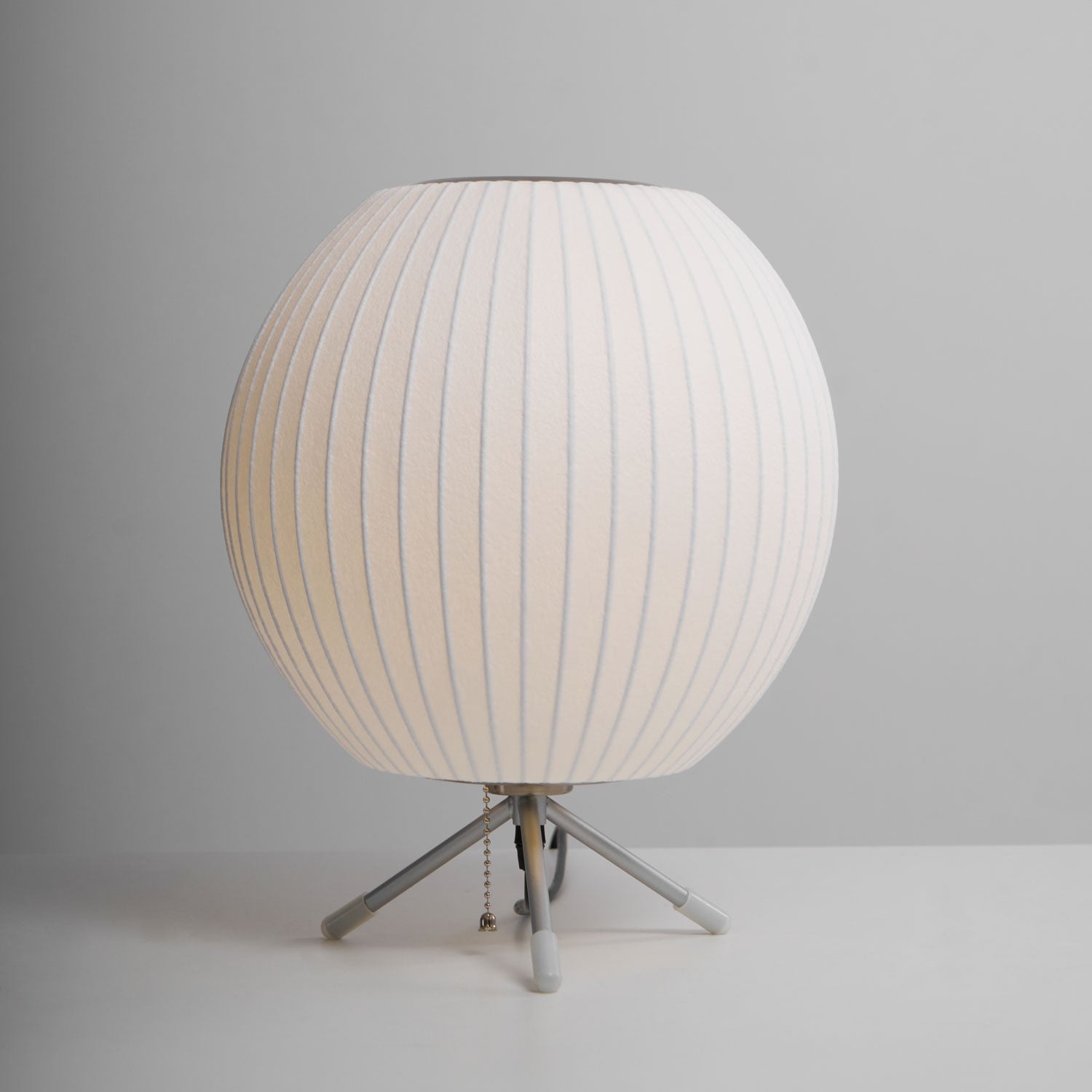 Sphere Form Table Lamp — Triangular Base, Warm Glow