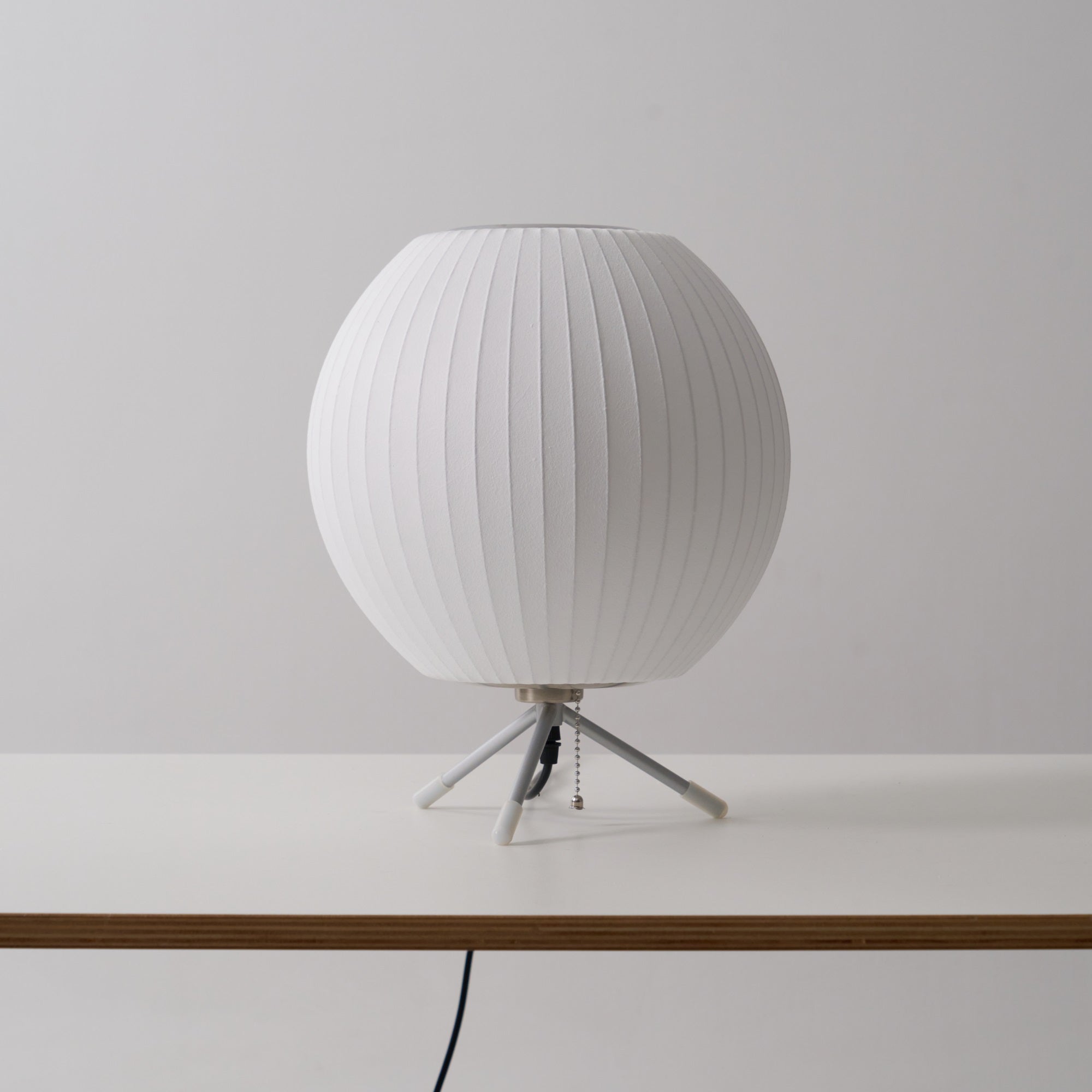 Sphere Form Table Lamp — Triangular Base, Warm Glow