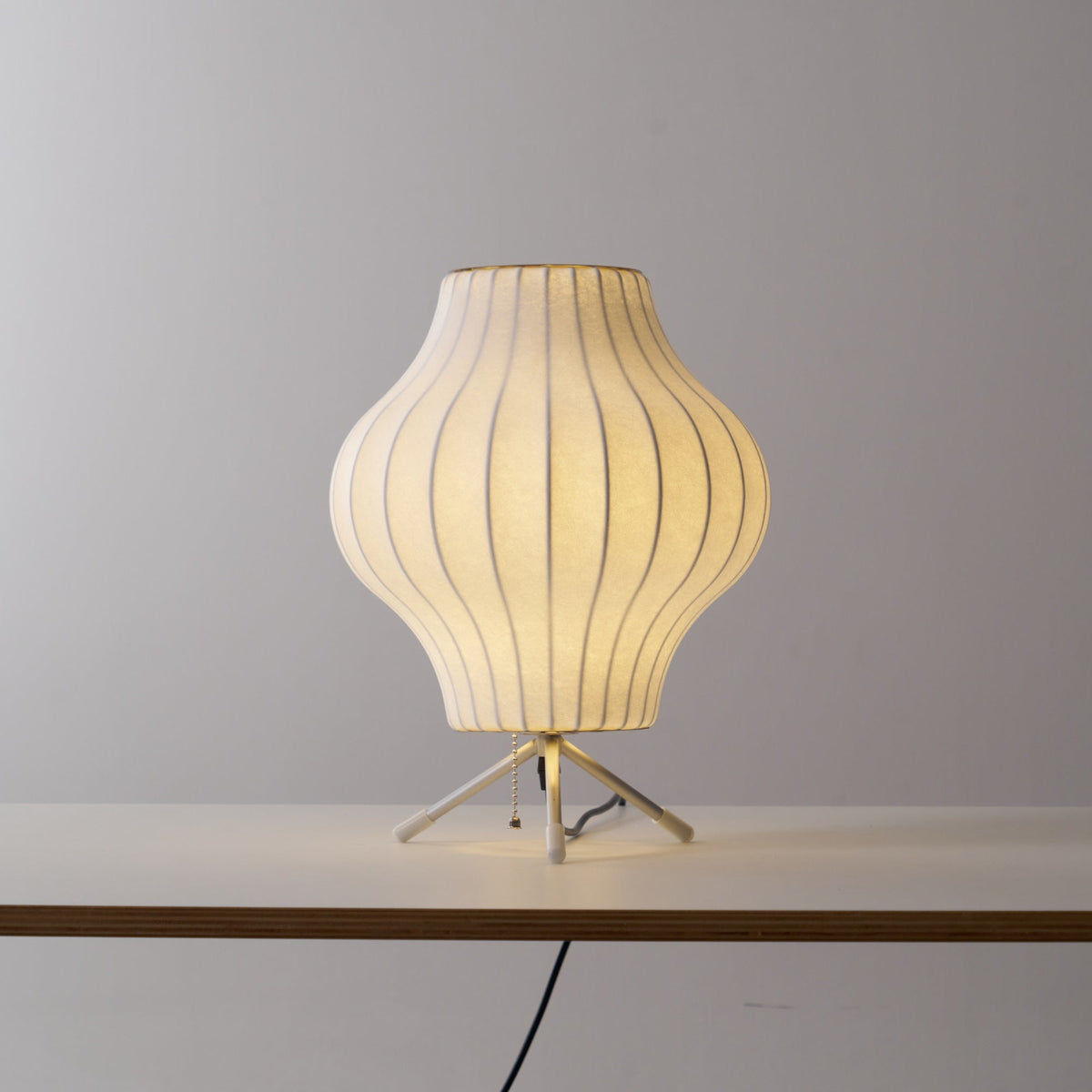 Sphere Form Table Lamp — Triangular Base, Warm Glow