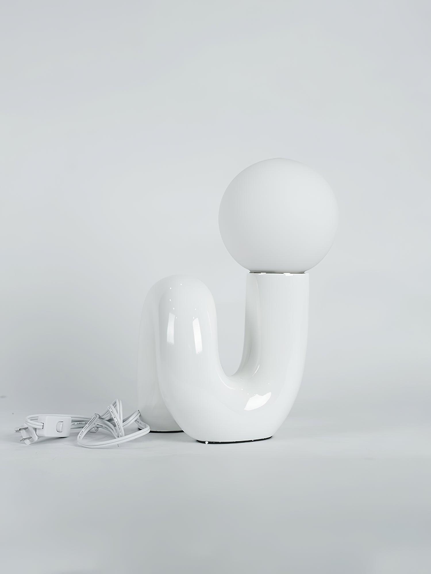 Candeeiro de mesa lúdico em forma de N — Forma orgânica escultural
