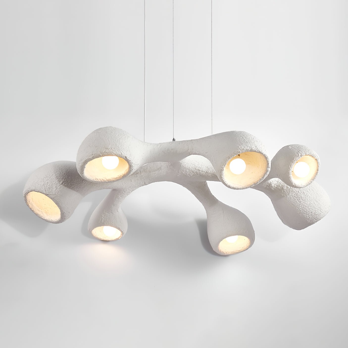 Pendulă cu formă sculpturală de nou-născut