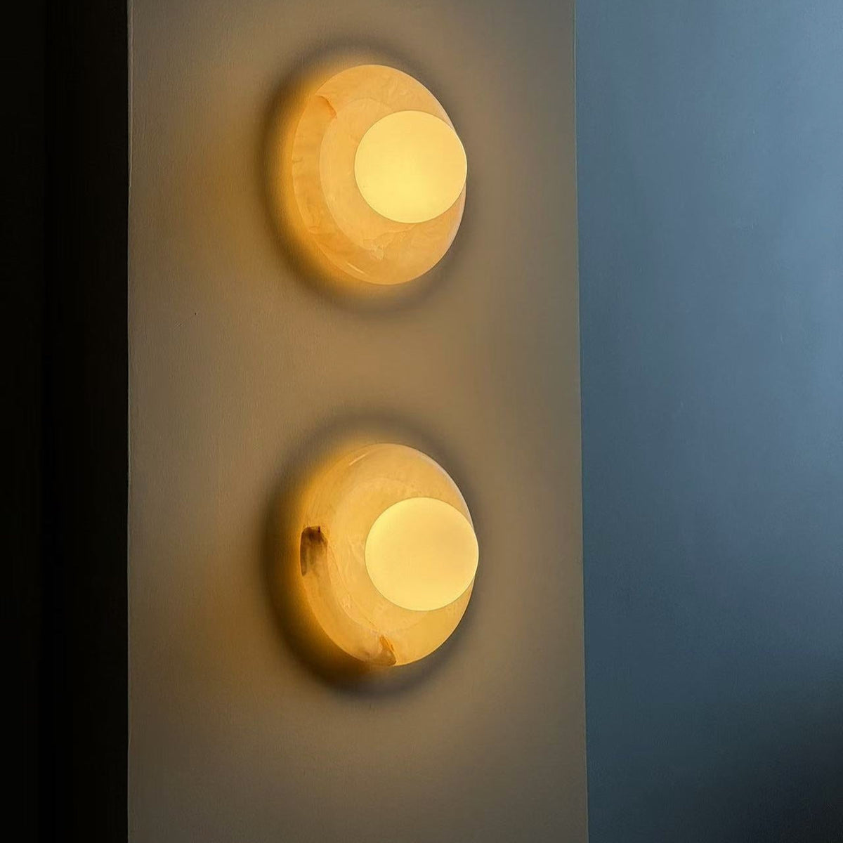 Avi Indoor Wall Sconce — Curved Marble Backplate, Round Design