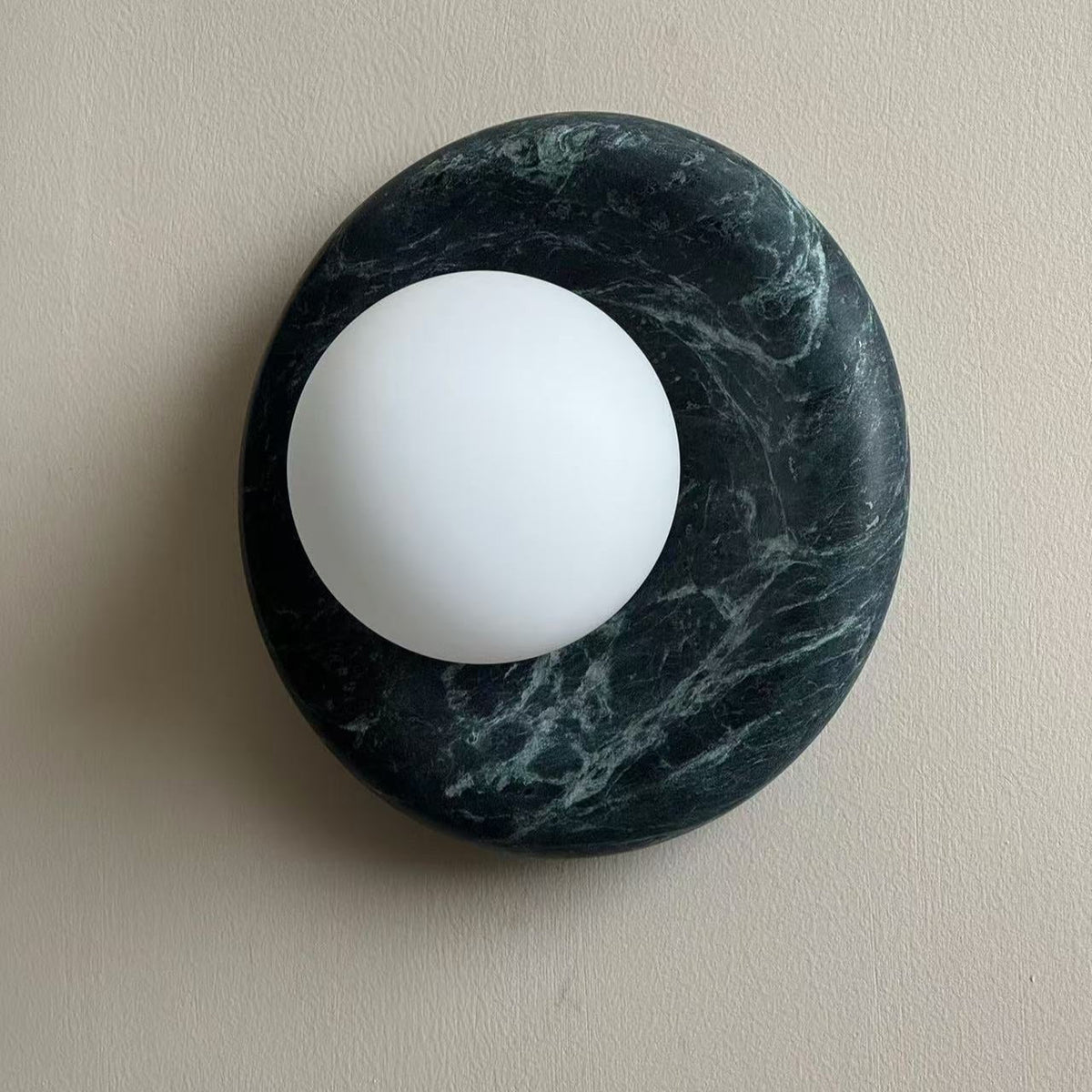 Avi Indoor Wall Sconce — Curved Marble Backplate, Round Design