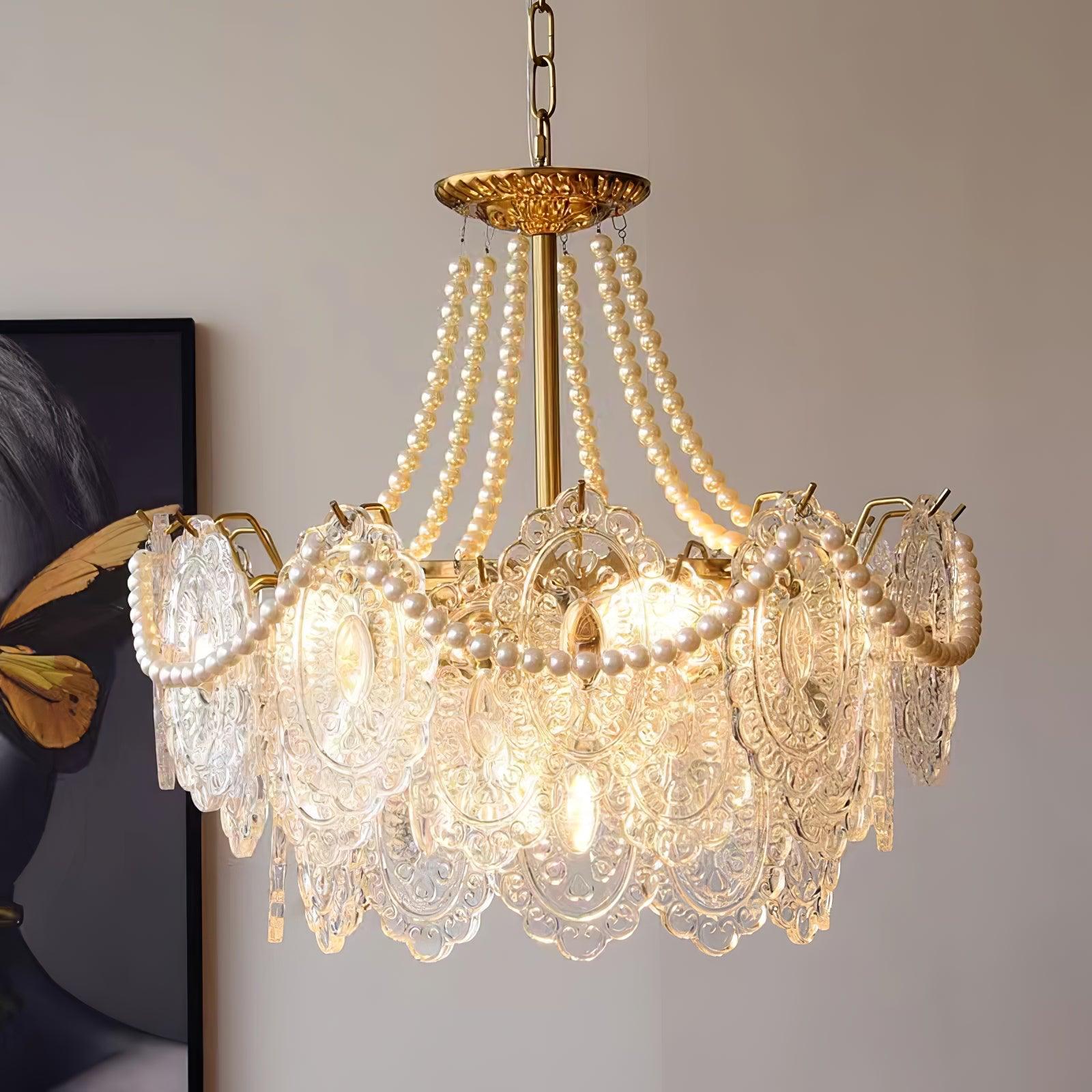 Perleglaslysekrone — moderne transparent pendeldesign