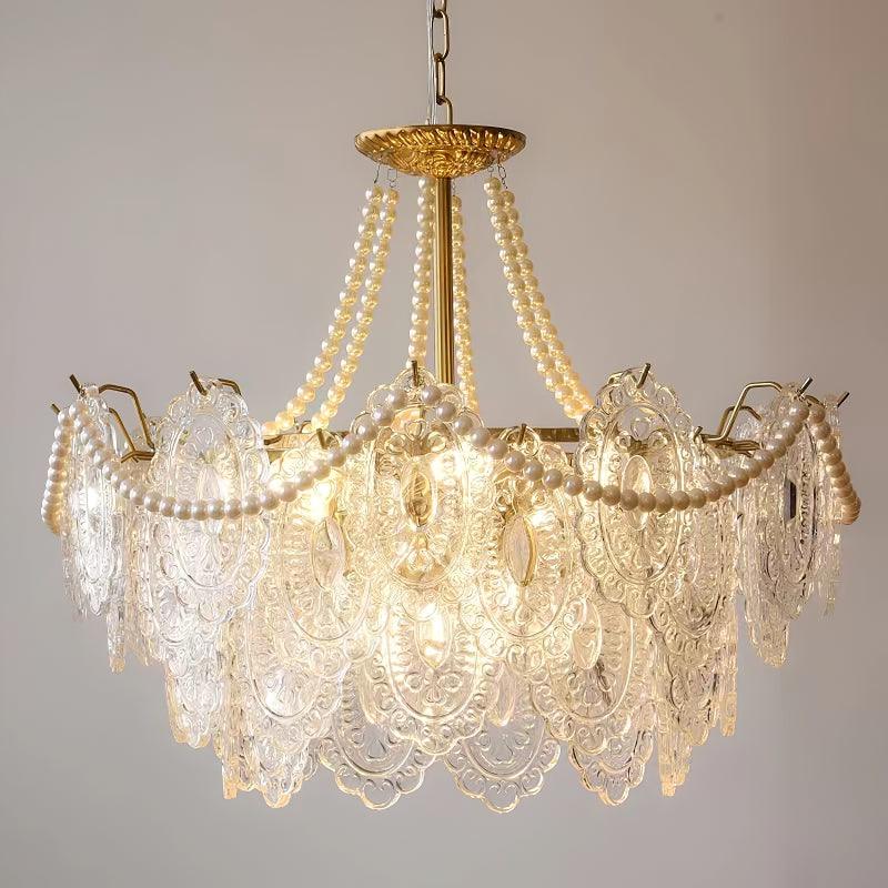 Perleglaslysekrone — moderne transparent pendeldesign
