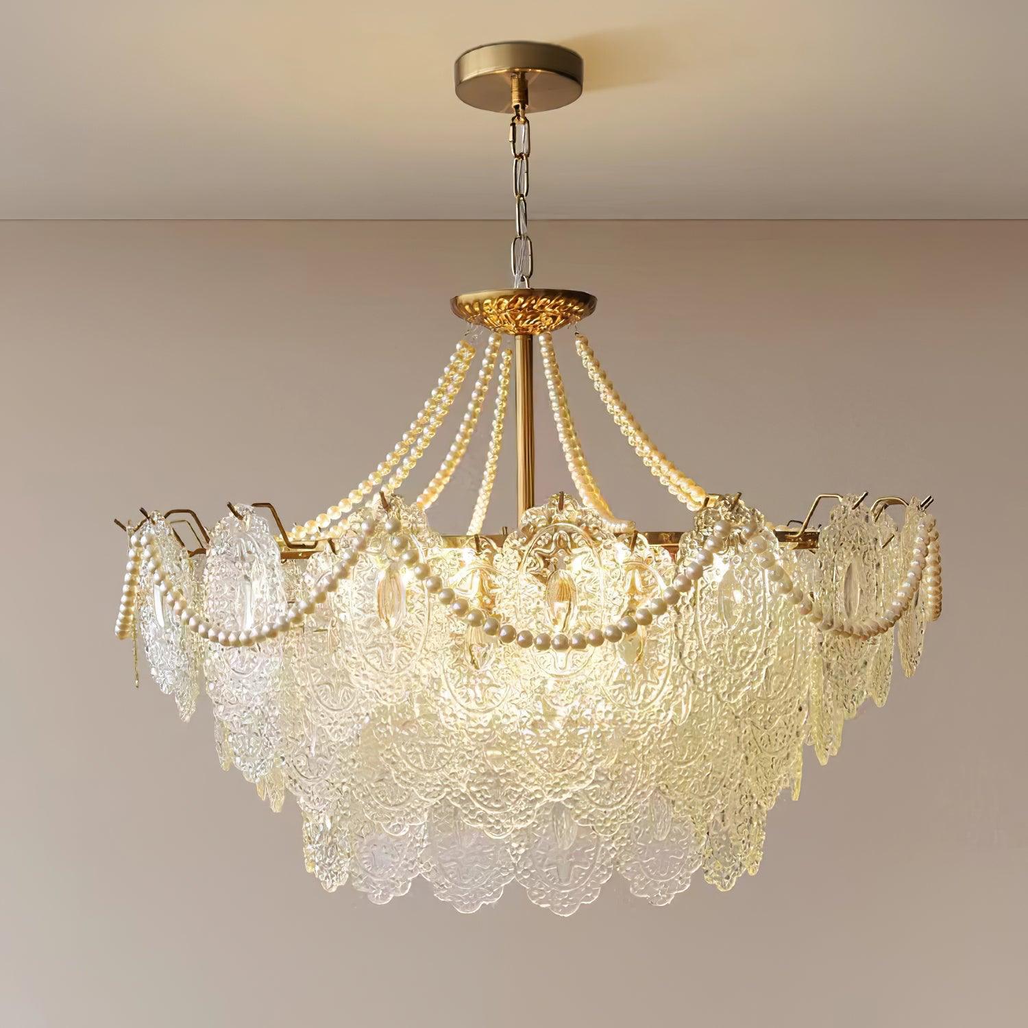 Perleglaslysekrone — moderne transparent pendeldesign