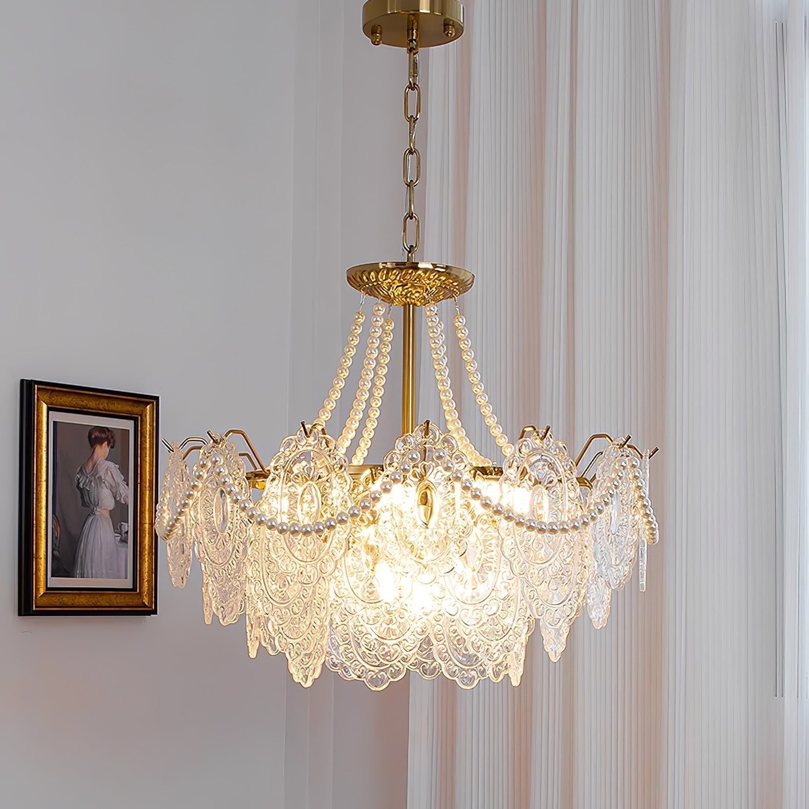 Perleglaslysekrone — moderne transparent pendeldesign