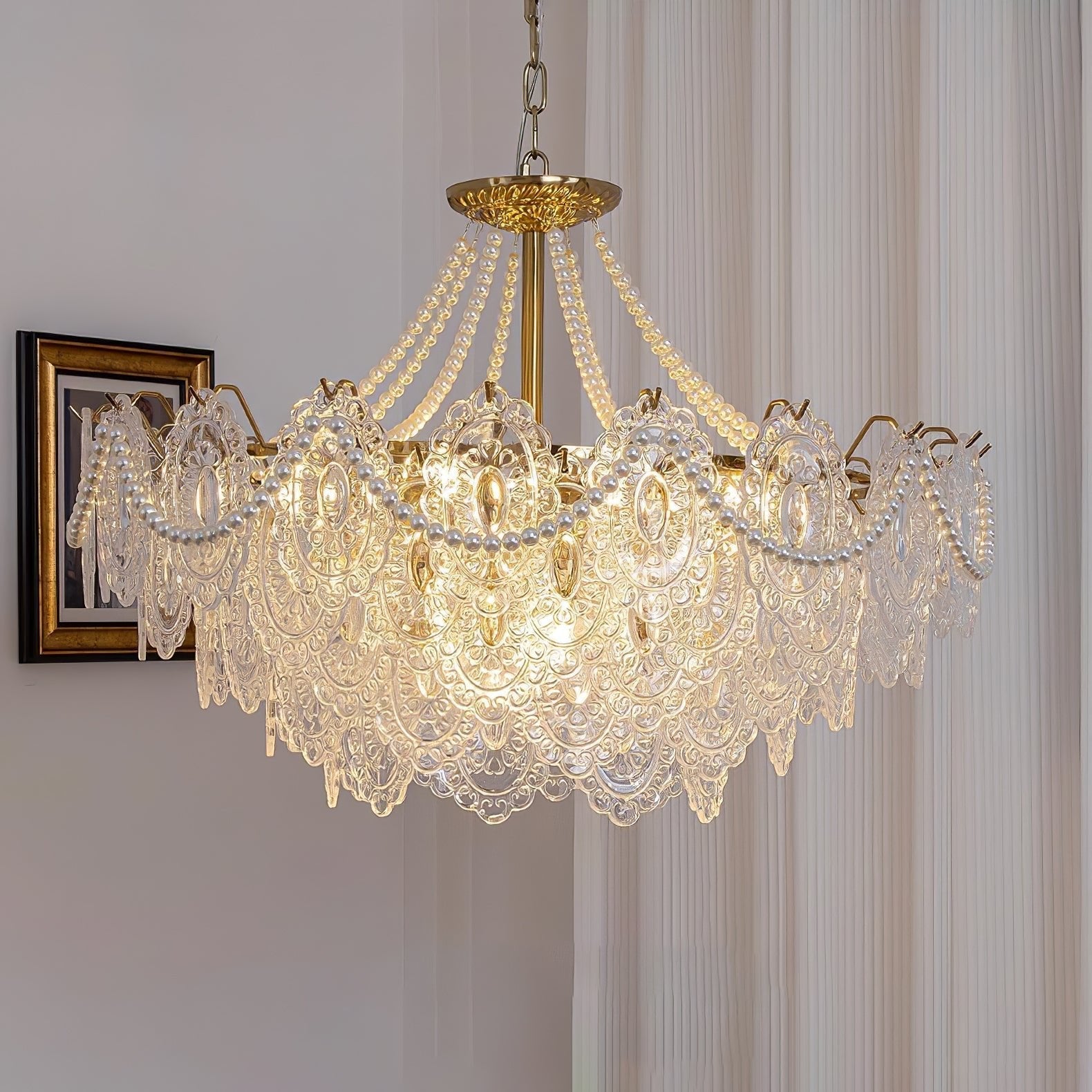 Perleglaslysekrone — moderne transparent pendeldesign