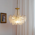 Perleglaslysekrone — moderne transparent pendeldesign