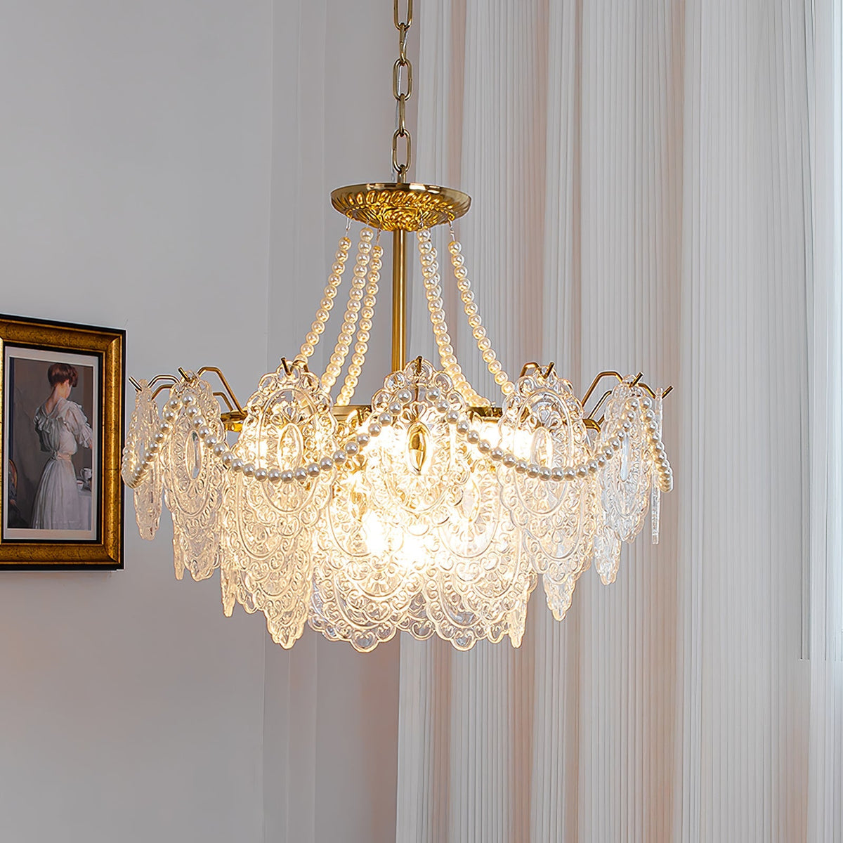 Perleglaslysekrone — moderne transparent pendeldesign