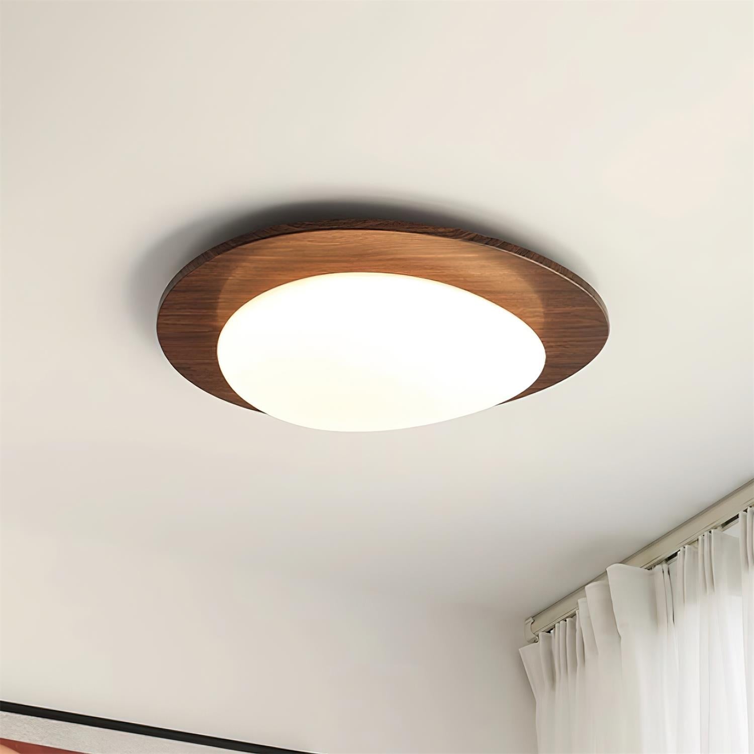 Lampada da soffitto in legno dal design a ciottolo