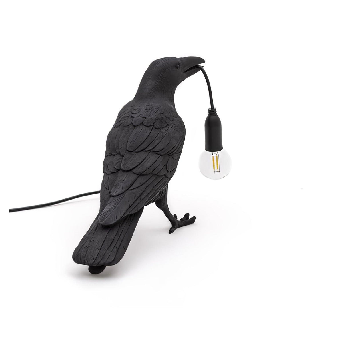 Sculpturale tafellamp van hars in de vorm van een raaf — verlichting met een Edison-lamp