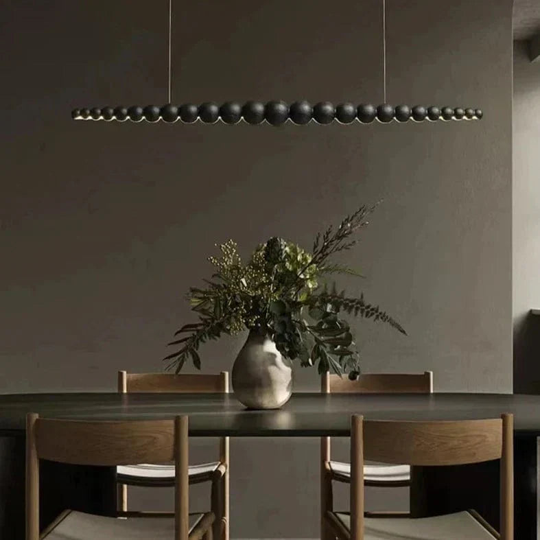 Lustre en perles de bois