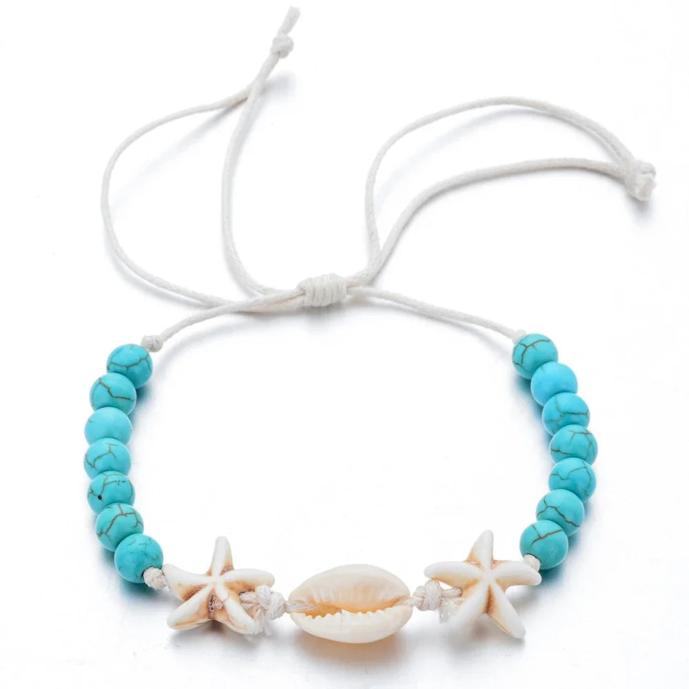 Unisex sommerarmbånd med søstjerner, muslingeskaller og flet