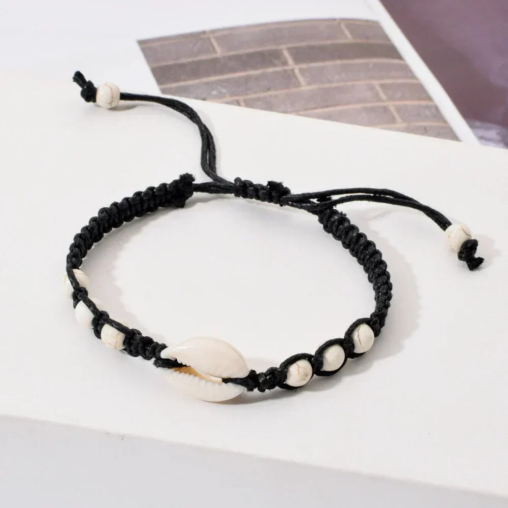 Unisex sommerarmbånd med søstjerner, muslingeskaller og flet