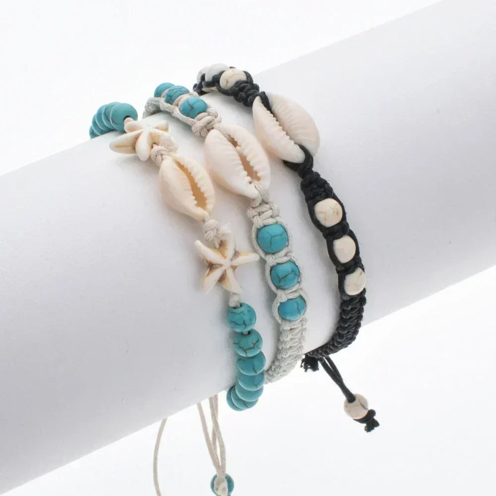 Unisex sommerarmbånd med søstjerner, muslingeskaller og flet