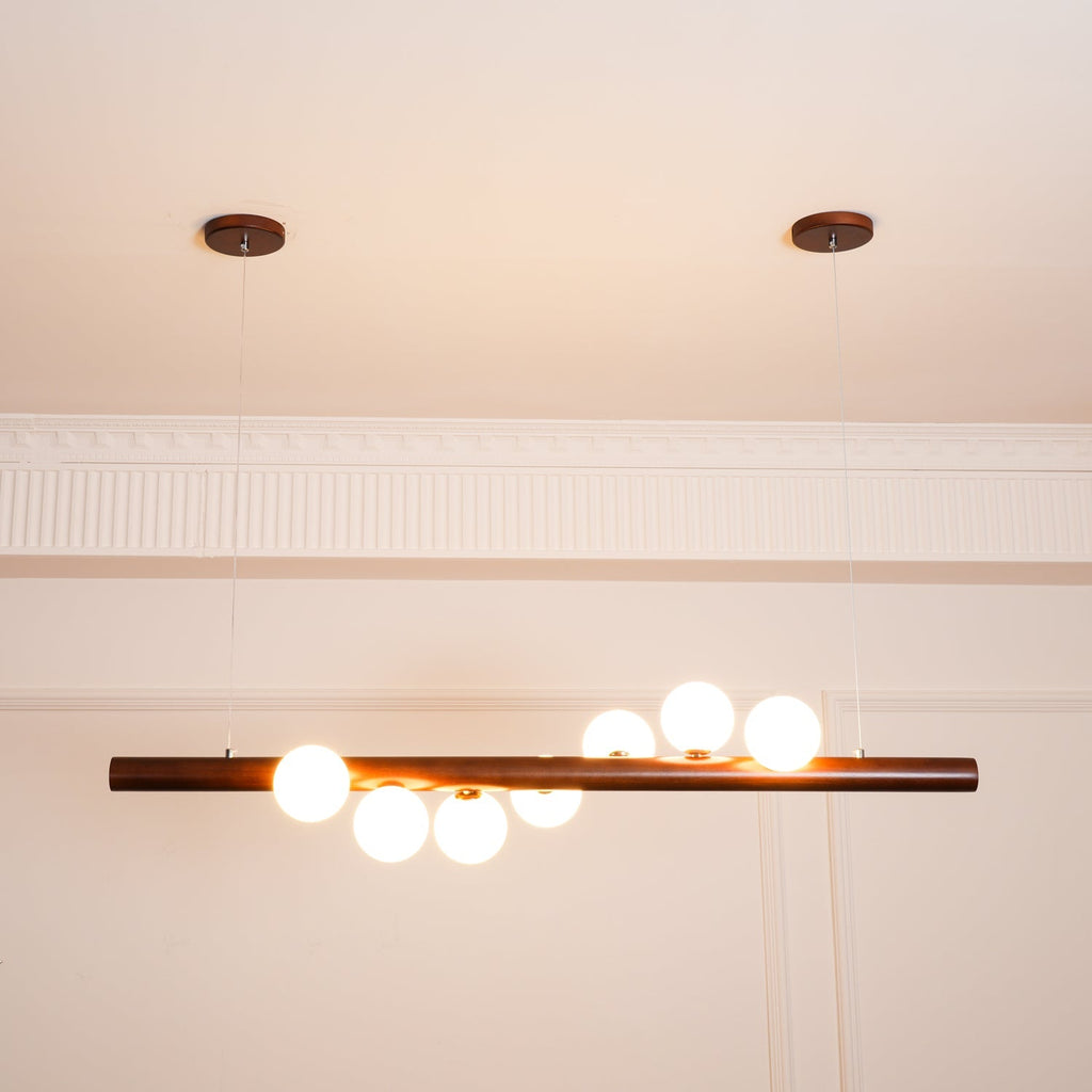 Contemporary Scandinavian Wooden Pendant Light — Linear Staggered Globes