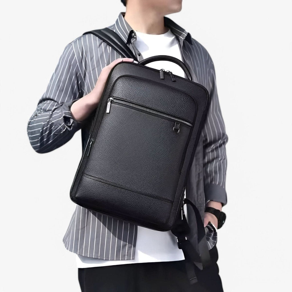 Zaino elegante in pelle con porta USB per laptop da 15.6 pollici, unisex