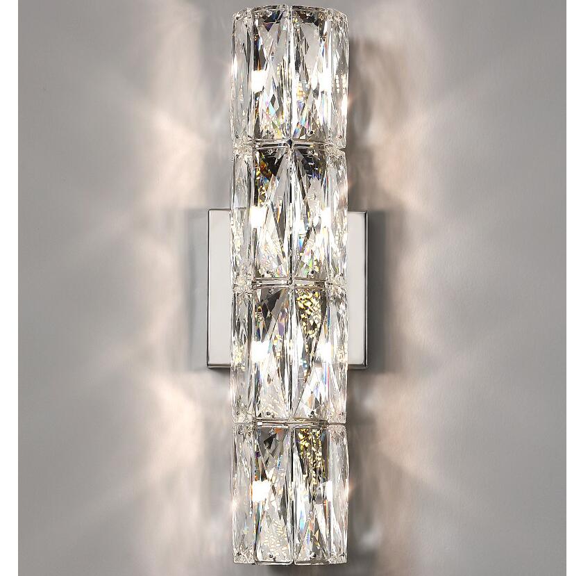 Applique da parete in cristallo con paralume trasparente e struttura in acciaio inox di Lumenara