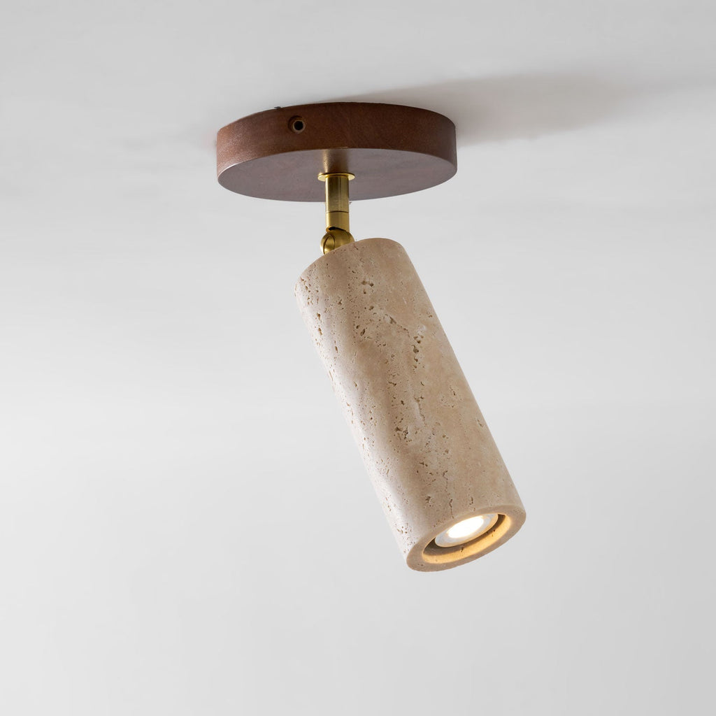 Faretto in pietra Solis — Cilindro in travertino, supporto in legno di noce, snodo in ottone