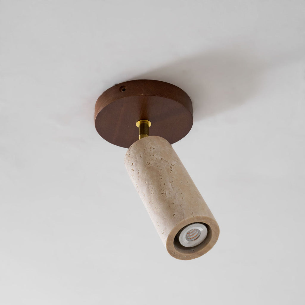 Faretto in pietra Solis — Cilindro in travertino, supporto in legno di noce, snodo in ottone