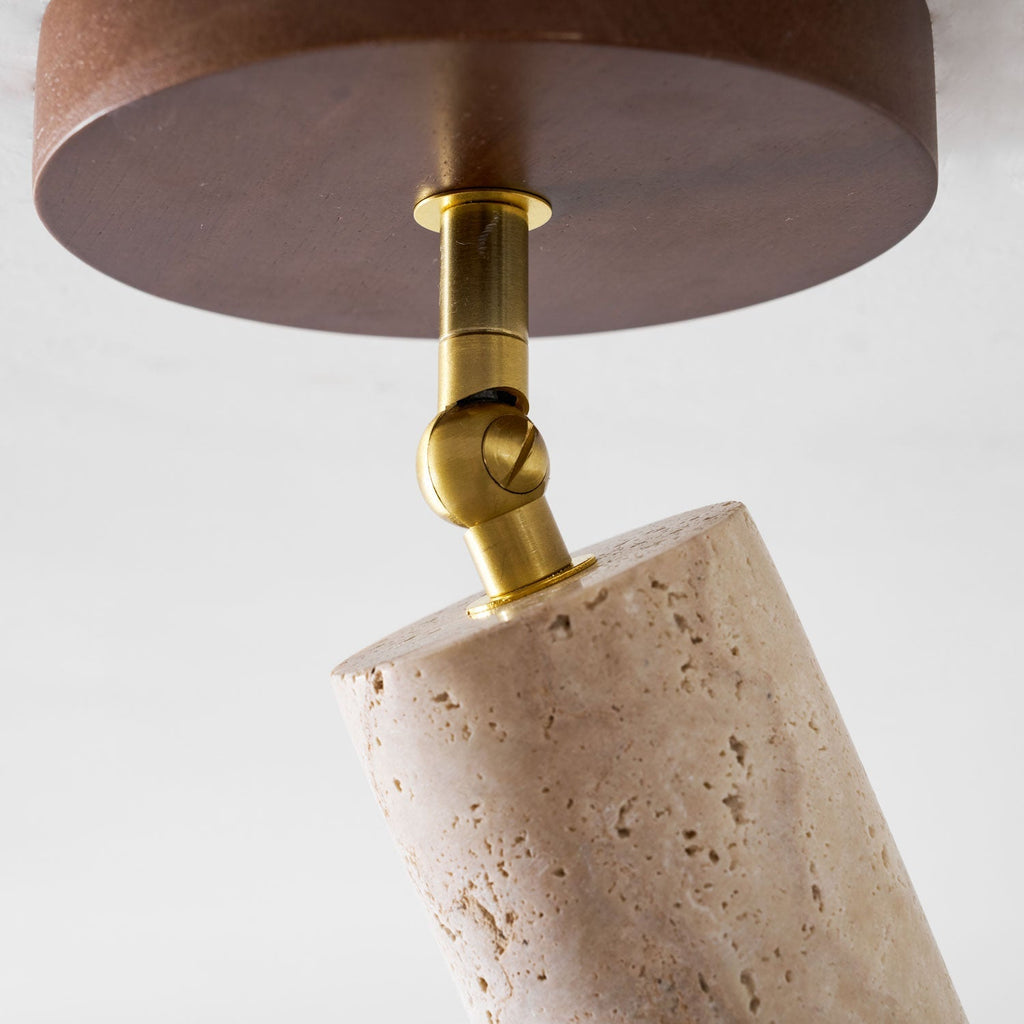 Faretto in pietra Solis — Cilindro in travertino, supporto in legno di noce, snodo in ottone