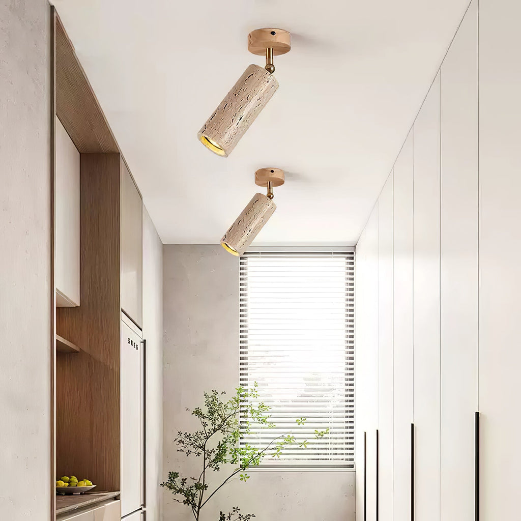 Faretto in pietra Solis — Cilindro in travertino, supporto in legno di noce, snodo in ottone