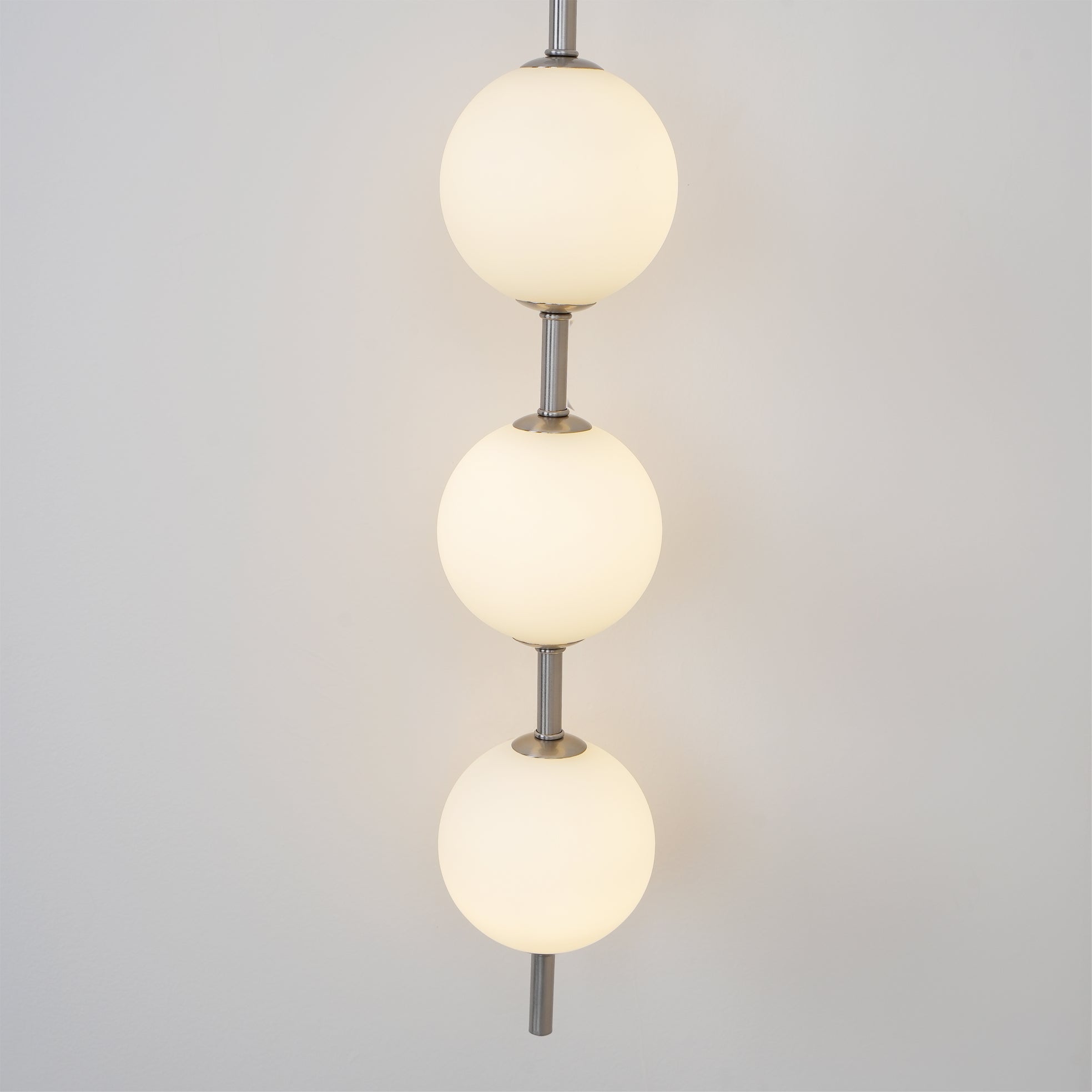 Vertical Globe Wall Sconce Matte White