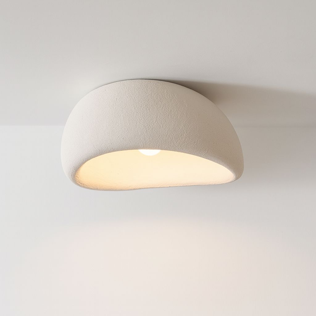 Lampada da soffitto minimalista in resina CalmGlow per ambienti tranquilli, con illuminazione morbida e uniforme