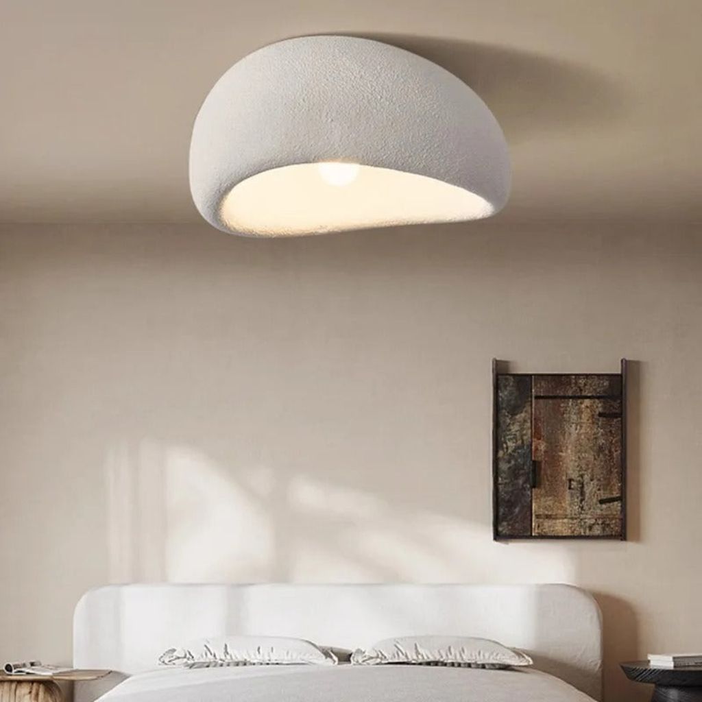 Lampada da soffitto minimalista in resina CalmGlow per ambienti tranquilli, con illuminazione morbida e uniforme