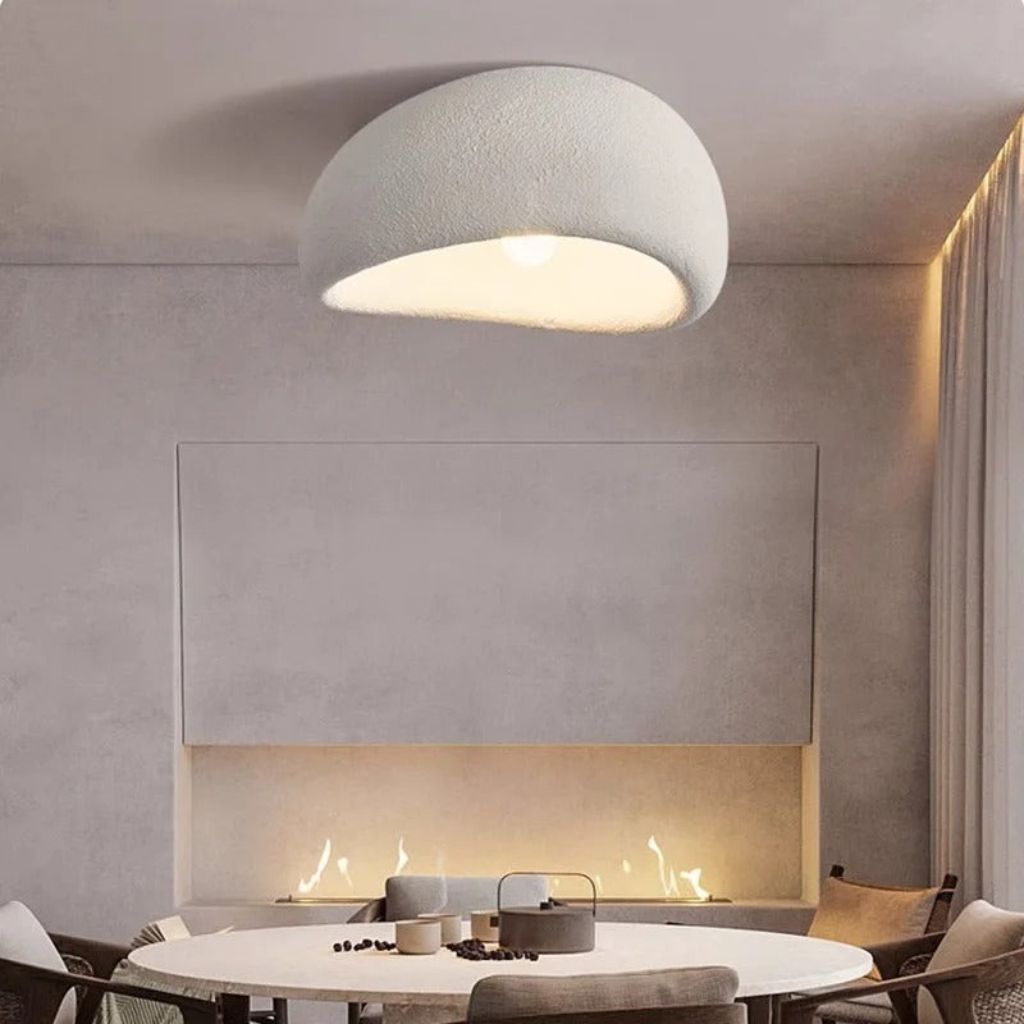 Lampada da soffitto minimalista in resina CalmGlow per ambienti tranquilli, con illuminazione morbida e uniforme