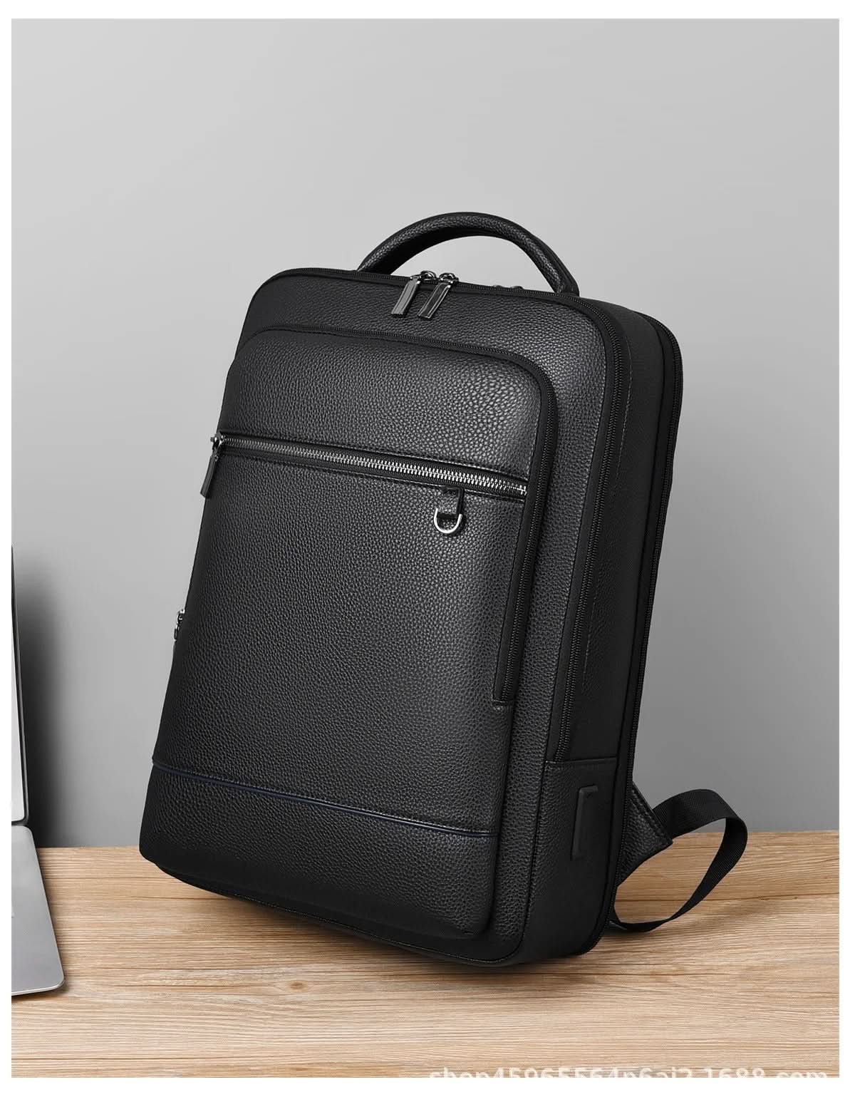 Zaino elegante in pelle con porta USB per laptop da 15.6 pollici, unisex
