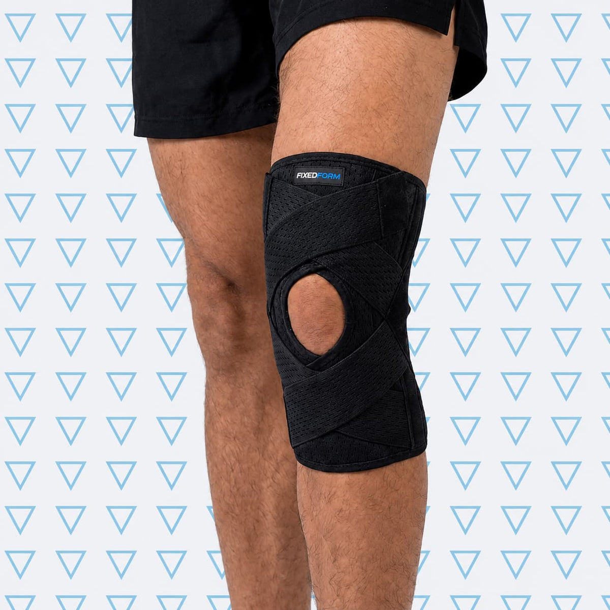 Man wearing the black knee brace with shorts