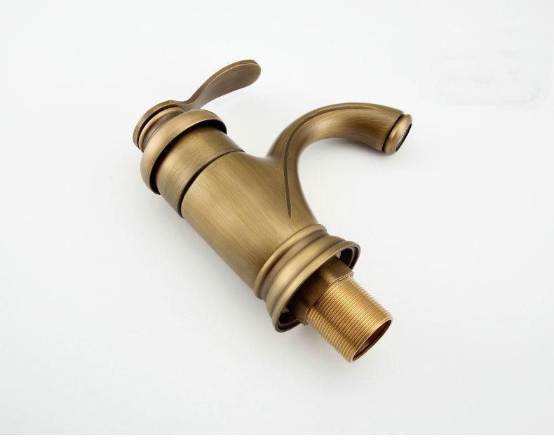 Grifo mezclador para lavabo de baño Arcline en latón antiguo