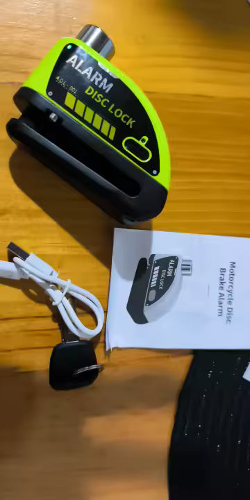 Alarm disc lock with USB charging cable and instructions