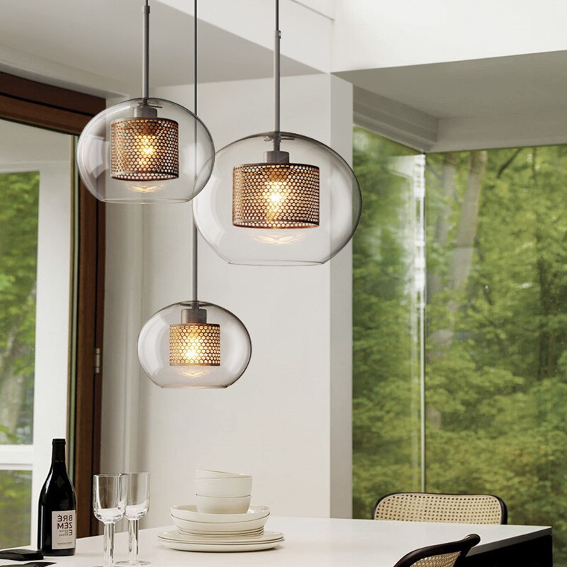 Hessa Contemporary Golden Pendant Light — Glass Globe and Cylindric Shape