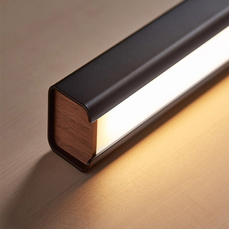 Liniowa lampa wisząca Orva — klasyczny czarno-biały design, minimalistyczne ściemnialne oświetlenie LED