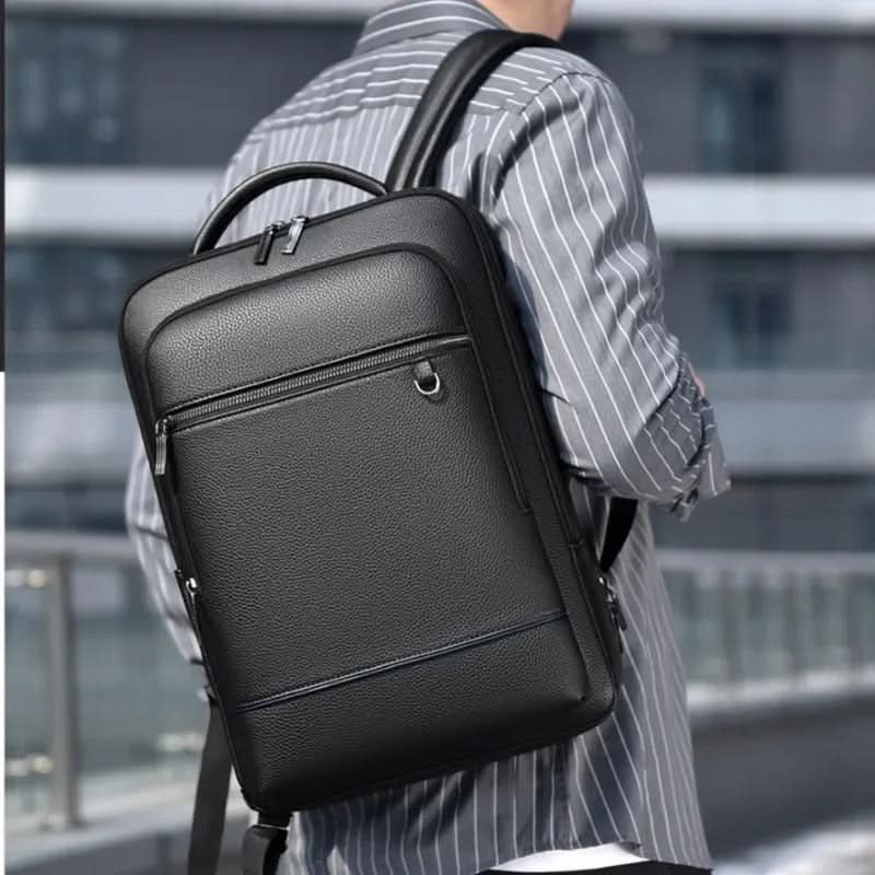 Zaino elegante in pelle con porta USB per laptop da 15.6 pollici, unisex